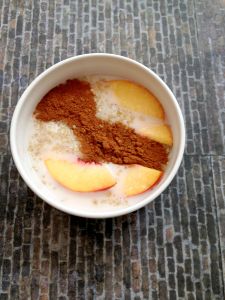 Vegan, Gluten-Free and Sugar-Free Peaches and Cream Quinoa Breakfast Bowl